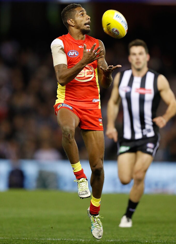 AFL 2016 Rd 22 - Collingwood v Gold Coast MELBOURNE, AUSTRALIA - AUGUST 20: Jarrod Garlett of the Suns marks the ball during the 2016 AFL Round 22 match between the Collingwood Magpies and the Gold Coast Suns at Etihad Stadium on August 20, 2016 in Melbourne, Australia. (Photo by Michael Willson/AFL Media)